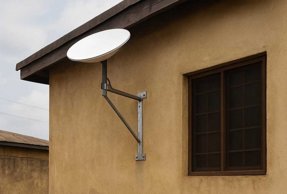 Wall-mounted Starlink dish installation in Nigeria for a stronger and more stable internet connection.